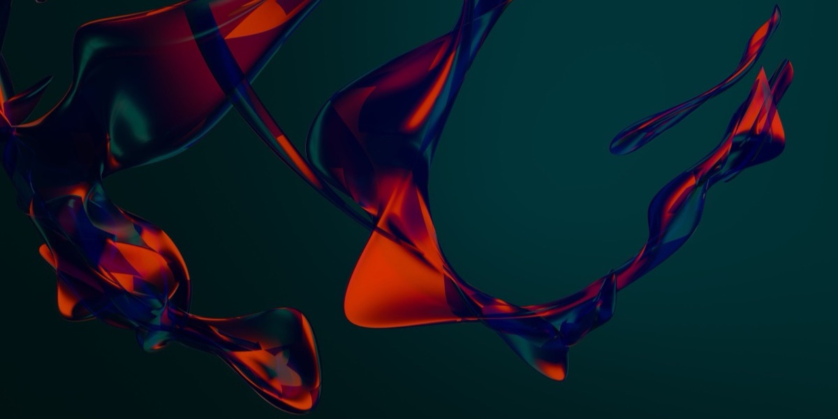 Abstract red and blue light forms swirling on a dark background